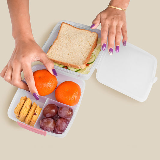 Wukusy 1400ml multipurpose lunch box with one large and three small compartments for home and kitchen use.