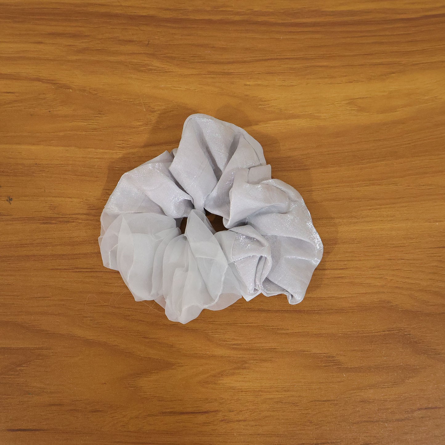 Wukusy dual-tone satin mesh fabric hair scrunchie showing soft, shiny satin and mesh textures in a close-up view