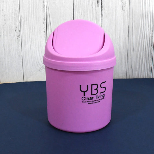 Small Wukusy mini trash can with lid, 18x13 cm, compact waste bin for home use, featuring a simple, functional design.