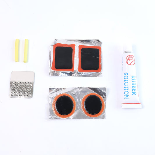 Wukusy bicycle tire repair kit with puncture repair tools and adhesive, portable set for fixing bike tires on the go.