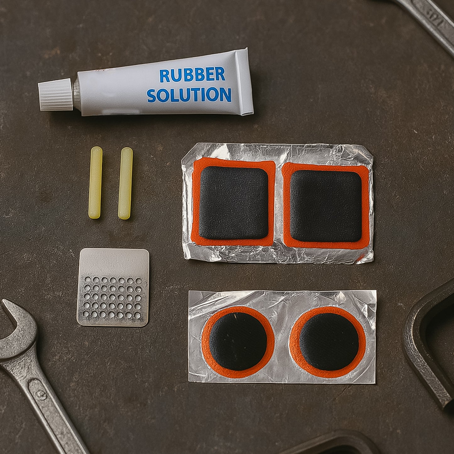 Wukusy bicycle tire repair kit with puncture repair tools and adhesive, portable for quick bicycle tire fixes.