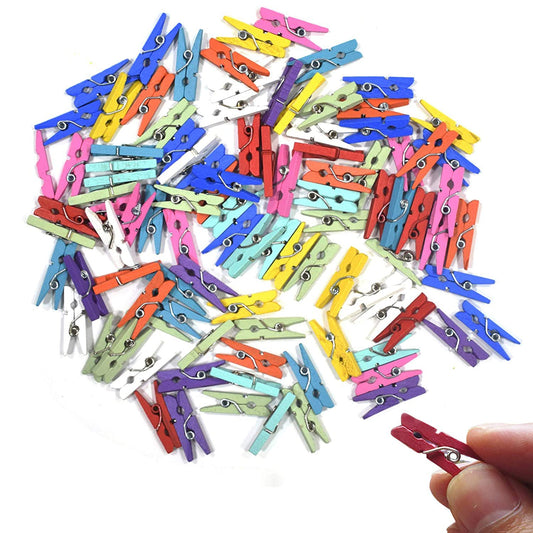 Set of 50 small Wukusy multipurpose wooden clips, cloth pegs for laundry, crafts, or hanging items.
