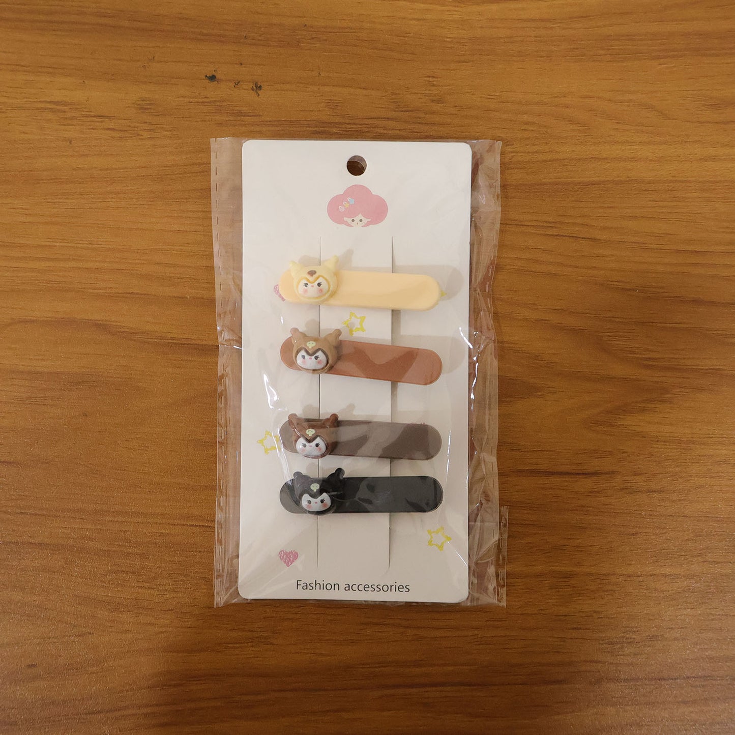 Set of four Wukusy cute cartoon animal face decorative hair clips, perfect for adding playful charm to hairstyles.