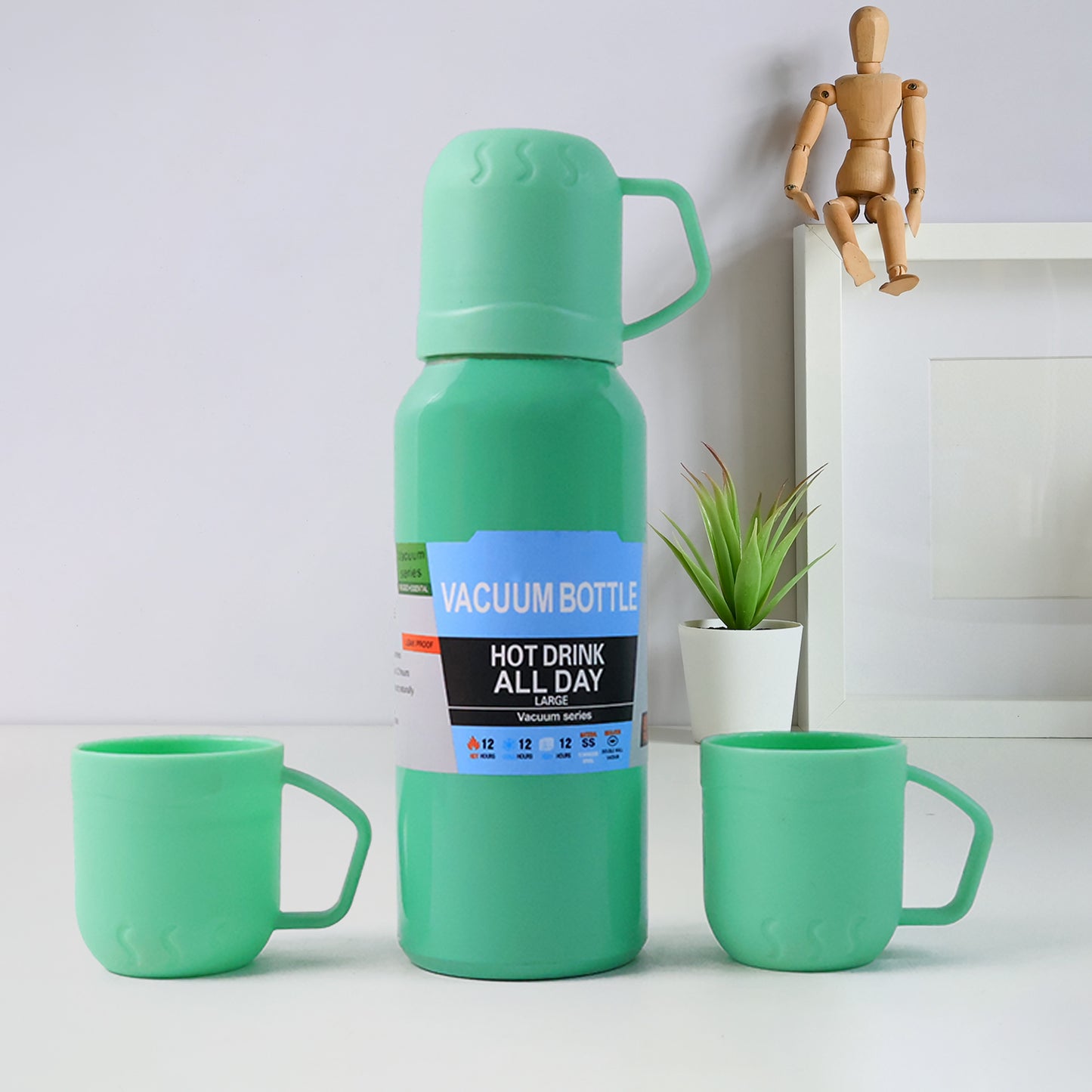 Green Wukusy stainless steel vacuum flask set with 3 cups, 500ml thermos for hot or cold beverages on the go.