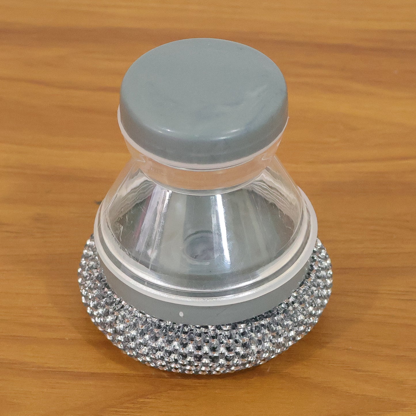 Wukusy liquid dispensing dish cleaning brush with handle and bristles, designed for easy dishwashing and cleaning.