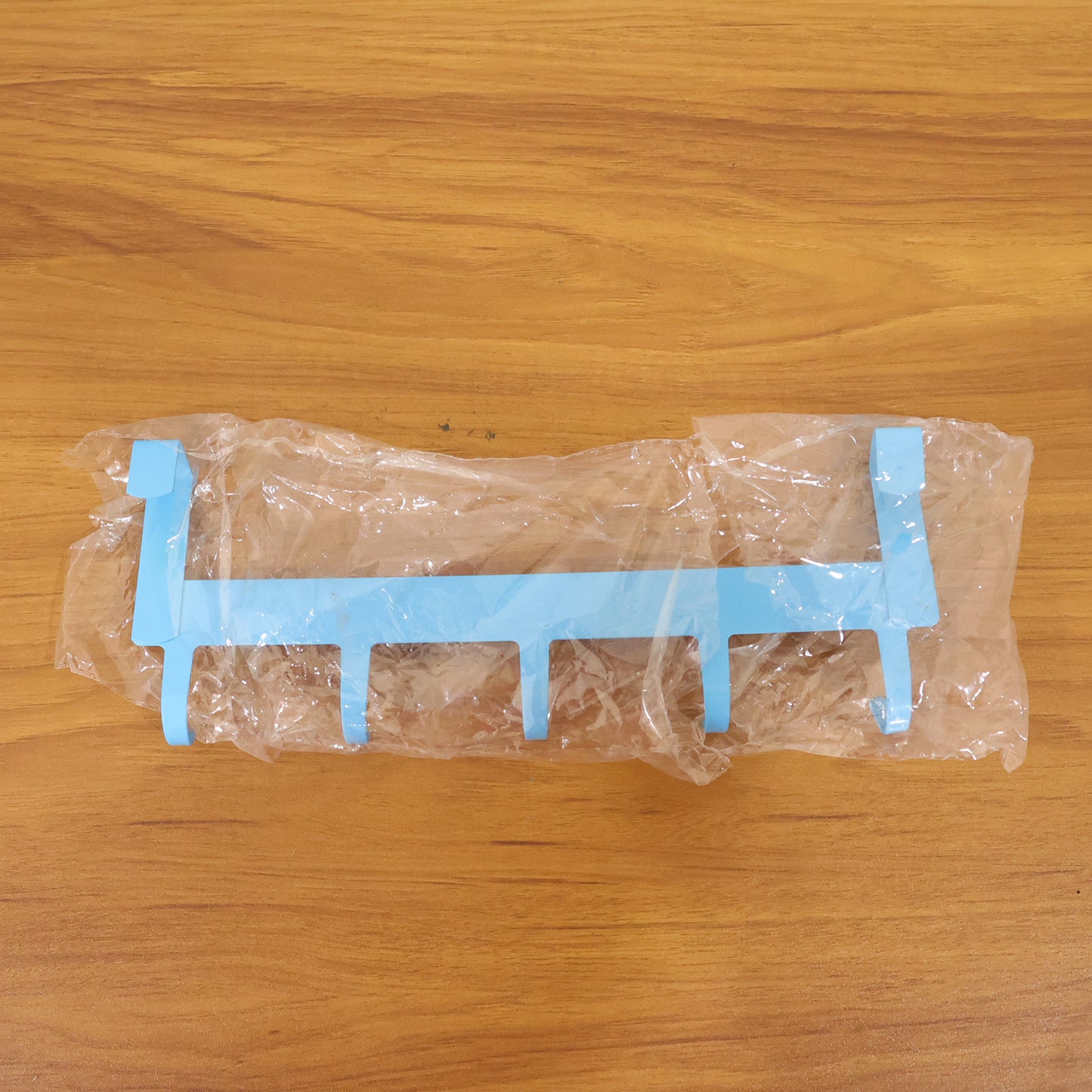 Wukusy Multi Metal 5 Hook Hanging Rack displaying five hooks on a sleek metal frame for organizing accessories or tools.
