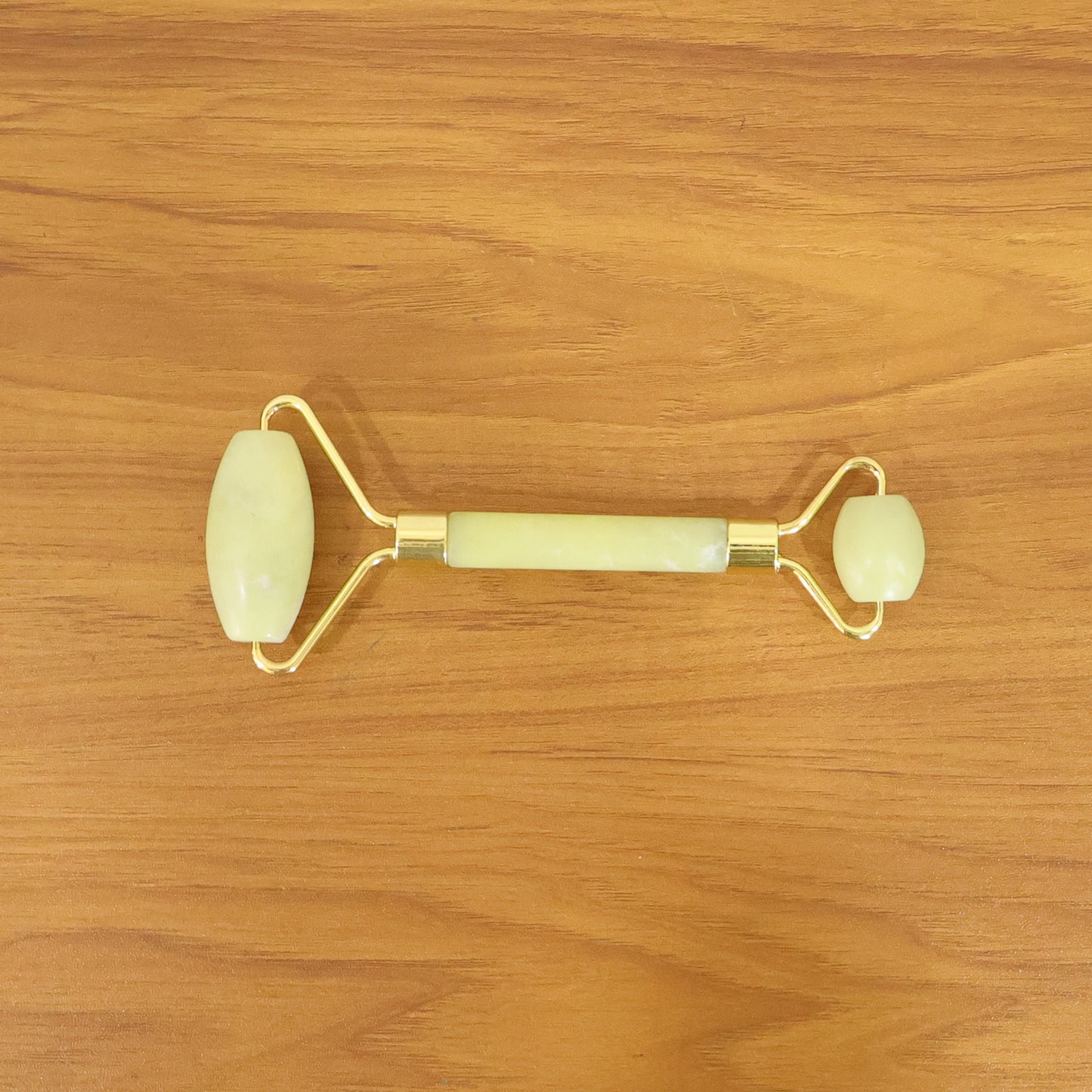 Wukusy premium dual-head jade stone face roller and Gua Sha massage tool set on a white background.