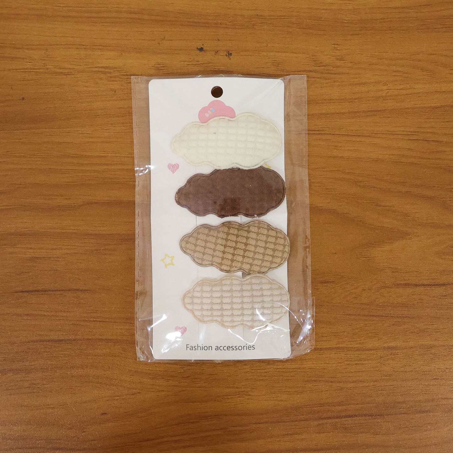 Set of four Wukusy premium padded cloud shape hair clips, colorful and soft for stylish hair accessory styling.