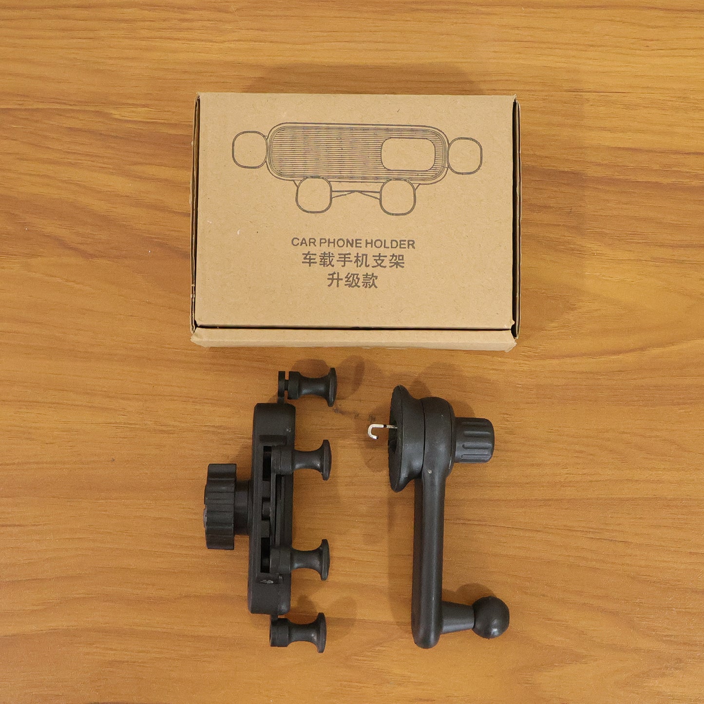 Wukusy universal car air vent mobile phone holder attached to a car vent, holding a smartphone securely.