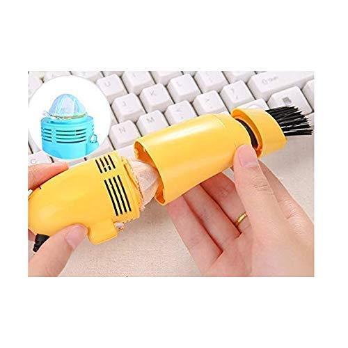 Wukusy 295 USB mini vacuum cleaner for computers and cars, compact electronics device with handheld design and cleaning nozzle.