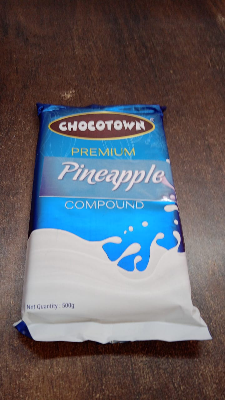 Wukusy Chocotown Premium Pineapple Compound, 500g jar of tropical pineapple-flavored food spread with a smooth texture.