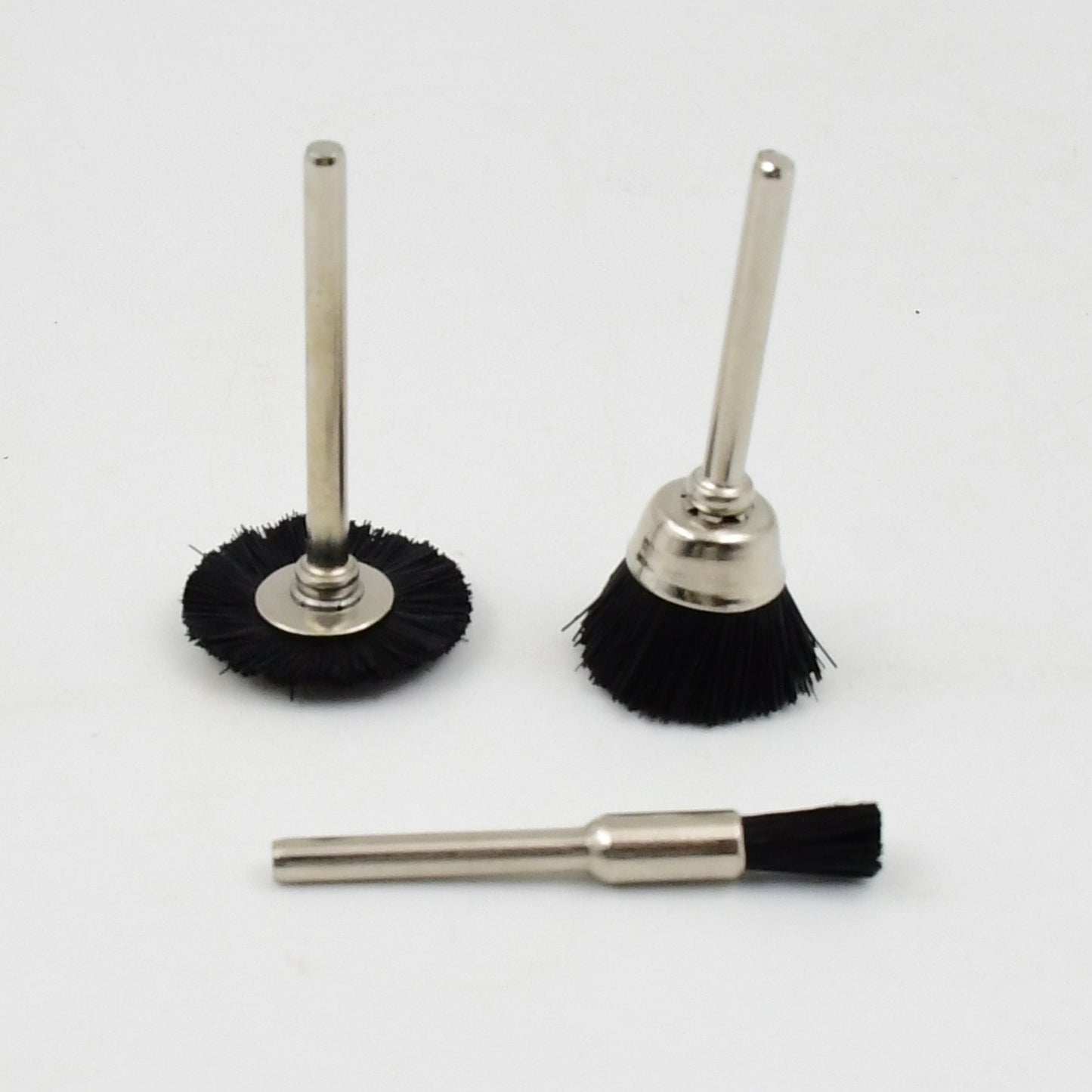 Set of three brass wire wheels for rust removal, Wukusy hardware tool, ideal for cleaning and polishing metal surfaces.