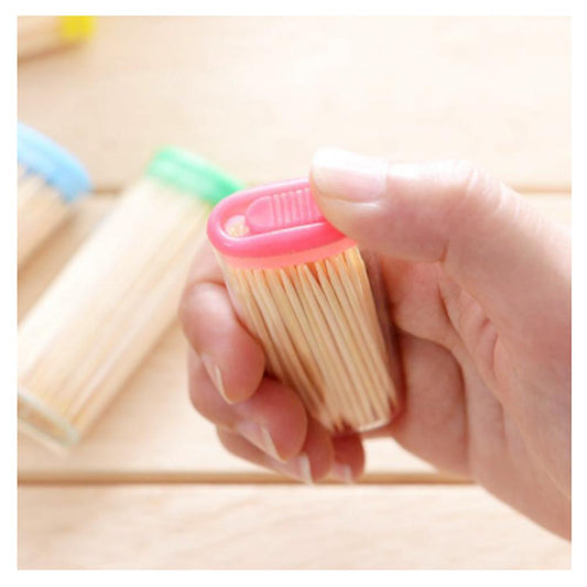 Wukusy 1095 bamboo toothpicks with dispenser box, eco-friendly dental care tool in a clear plastic box.