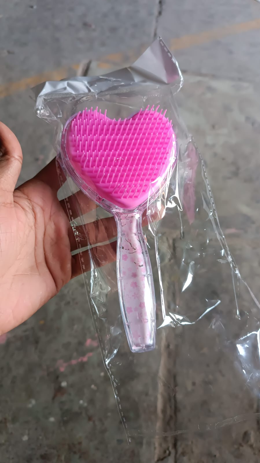 Heart-shaped Wukusy hair brush massage shower comb for gentle detangling and scalp massage, made for healthy hair care.