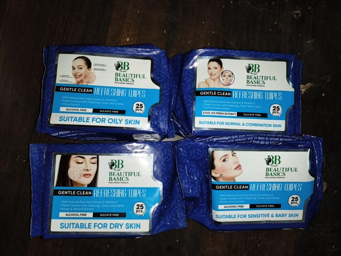 Wukusy Beautiful Basics dry, oily, sensitive, normal skin face wipes in a 4-pack, 100 wipes each, for gentle skincare.