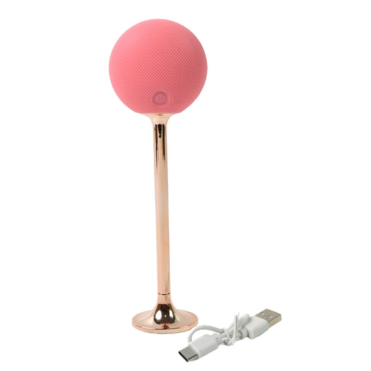 Wukusy Face Spa Massage Hammer for facial massage, vibrating beauty care tool with a sleek design for relaxing skin treatment.