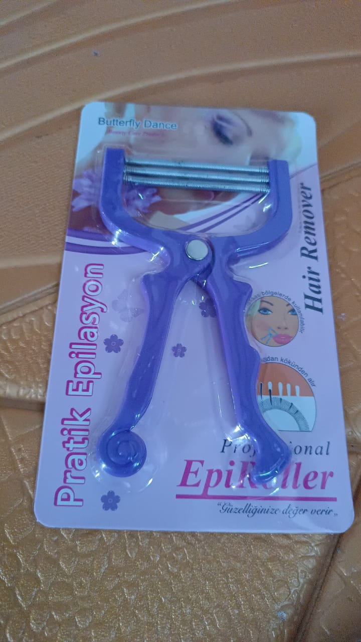 Wukusy facial hair remover depilator threading for face hair removal, close-up of handheld device on a white background.