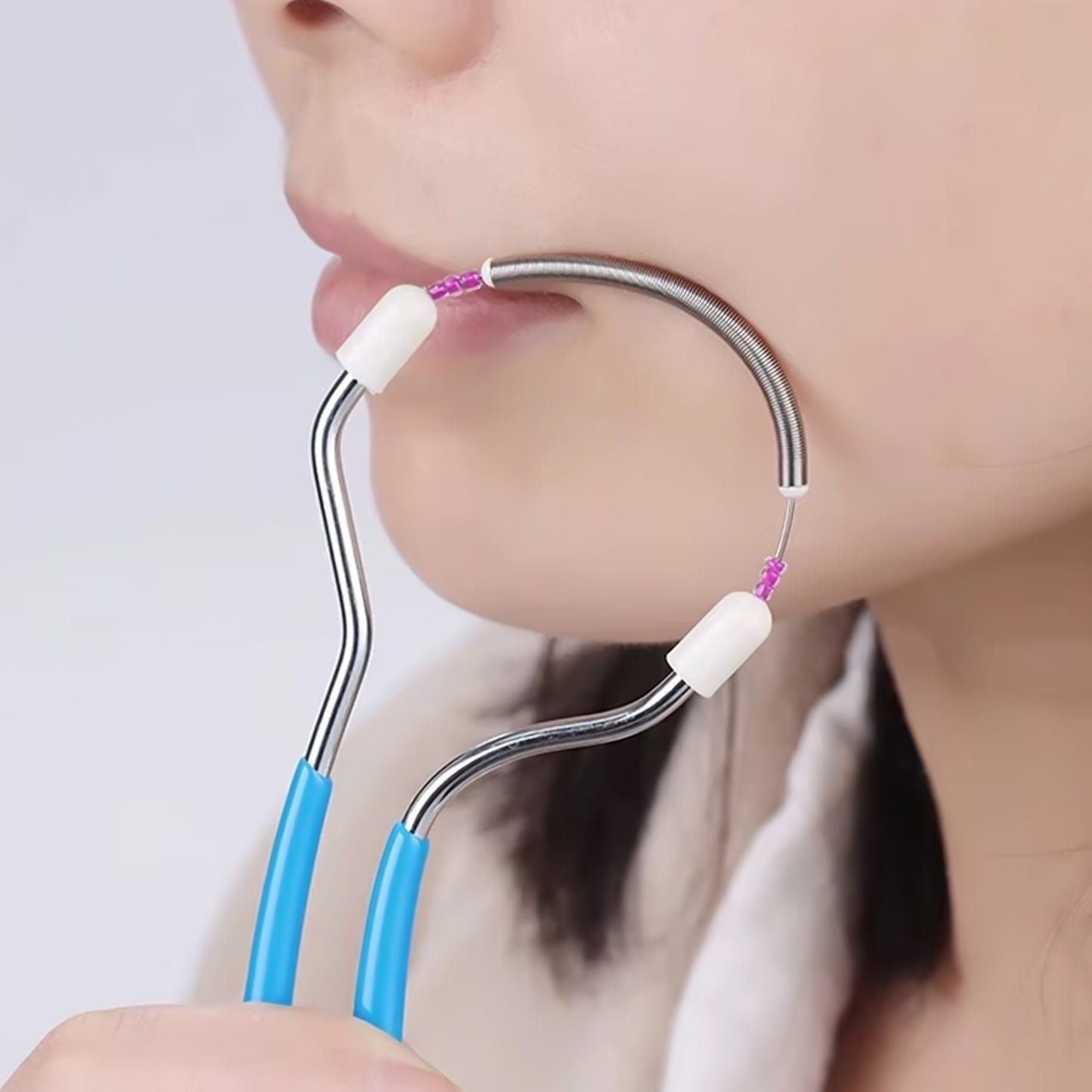 Wukusy facial hair remover portable spring for women, compact health care device for gentle facial hair removal.