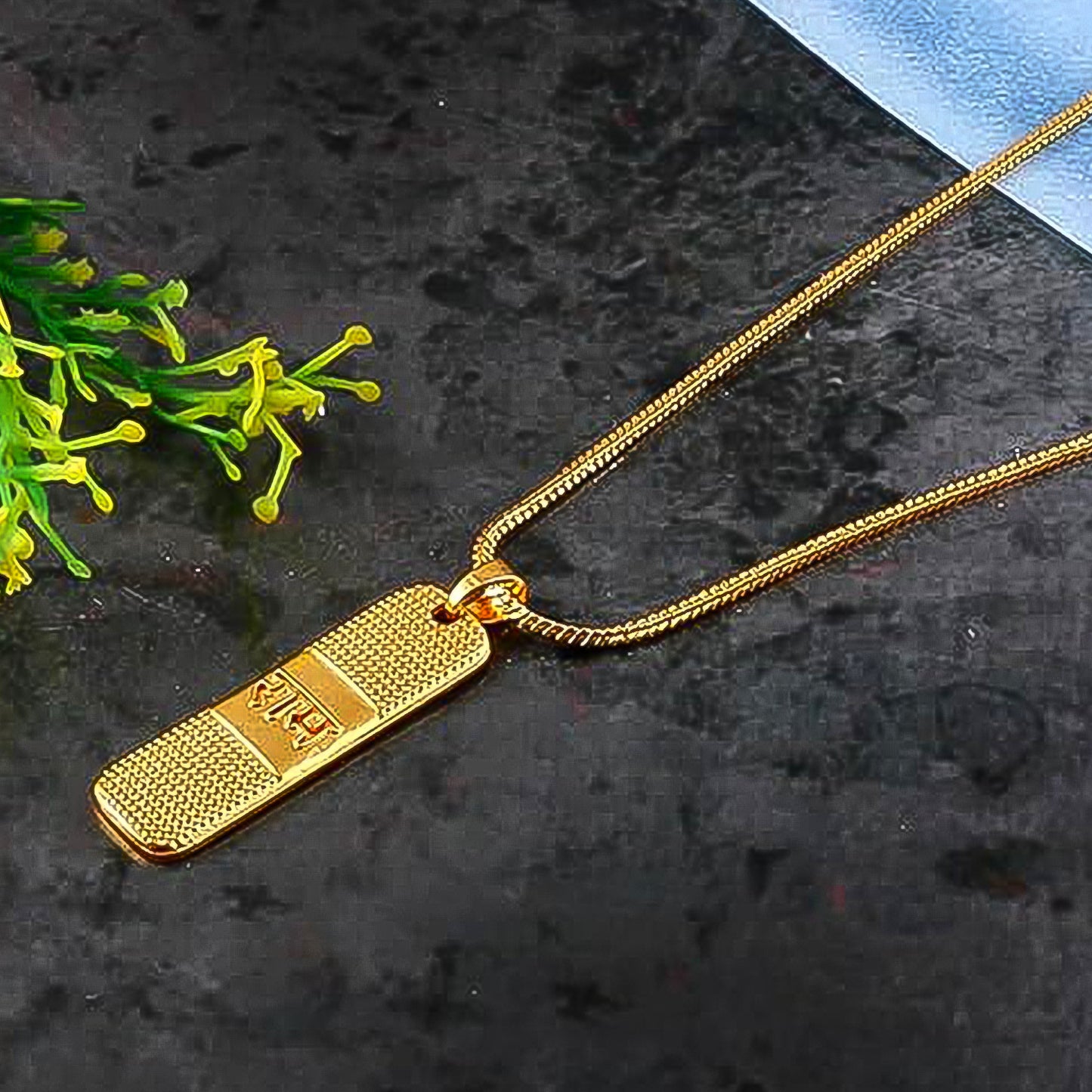 Gold Ram Naam Locket with chain by Wukusy, showcasing intricate religious pendant on a chain for spiritual devotion.