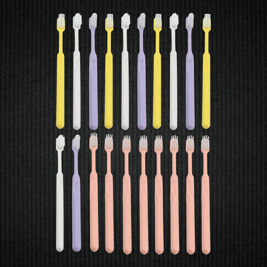 Set of 20 Wukusy plastic toothbrushes with round plastic storage boxes, ideal for travel and daily oral care.