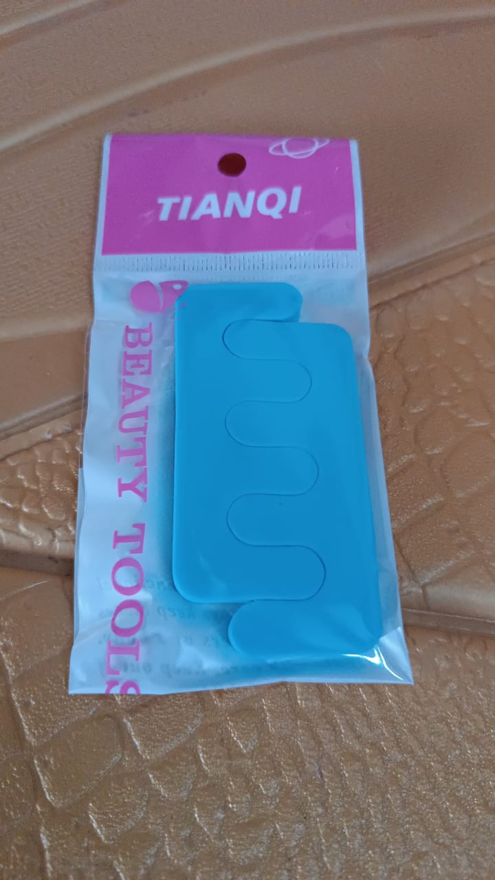 Wukusy sponge toe separators and spacers for toe stretching, ideal for pedicures and foot health, shown in a pair.