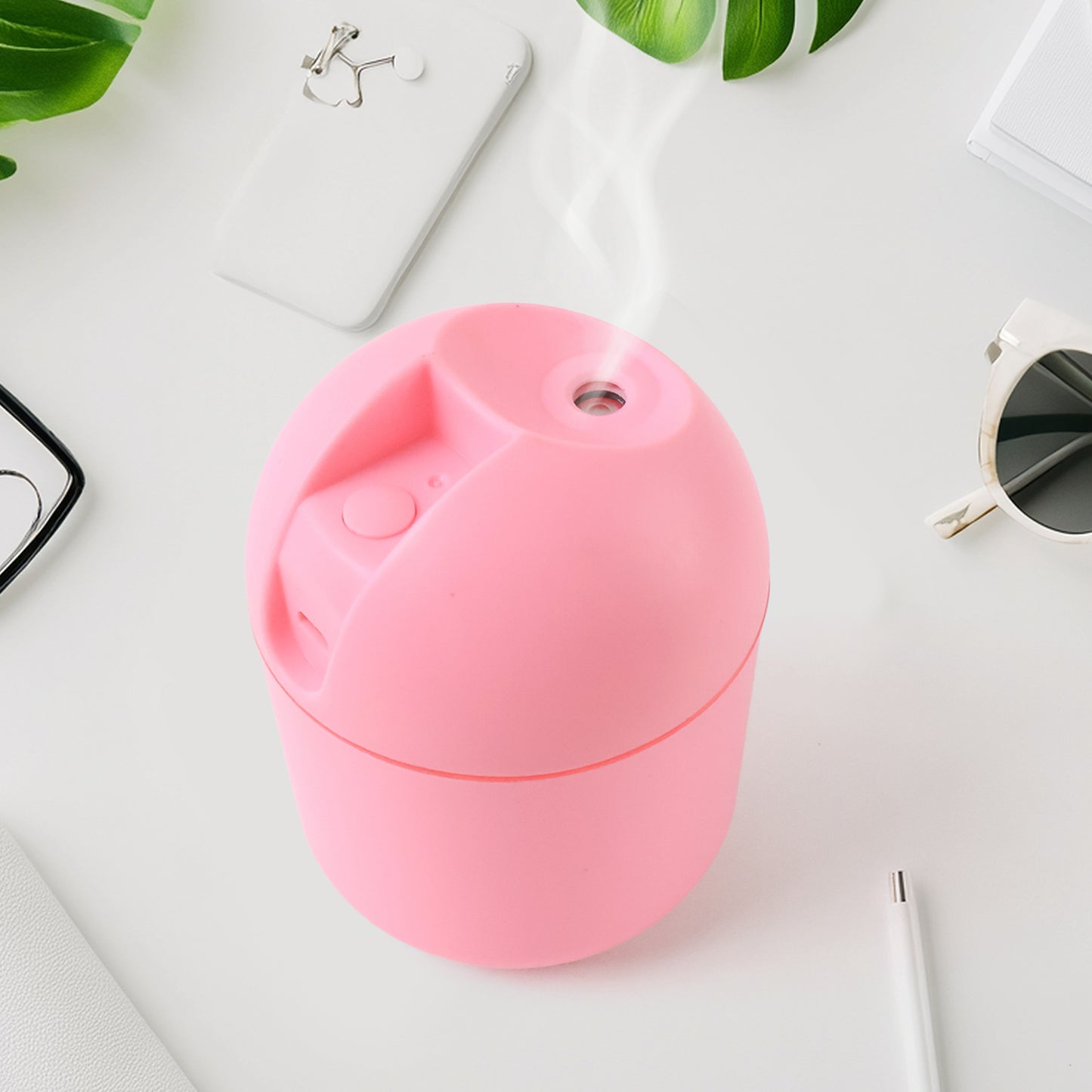 Wukusy USB mini air humidifier for home or office, compact health care device with mist spray showing in the image.