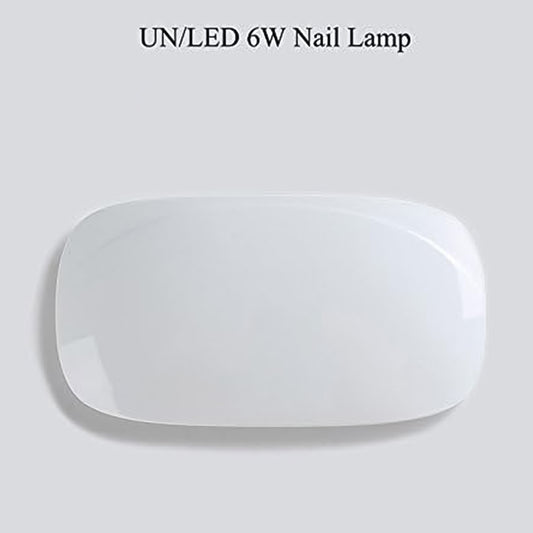 Wukusy mini portable UV LED nail lamp for professional nail drying, compact health care device for quick curing of gel nails.