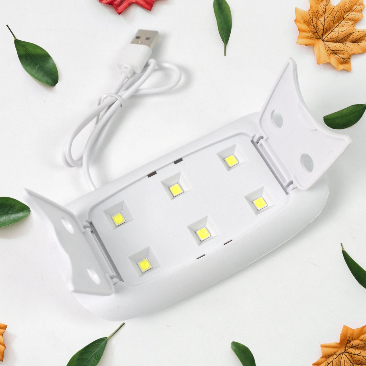 Wukusy UV LED nail dryer mini portable lamp for professional nail curing, compact and lightweight for quick drying.