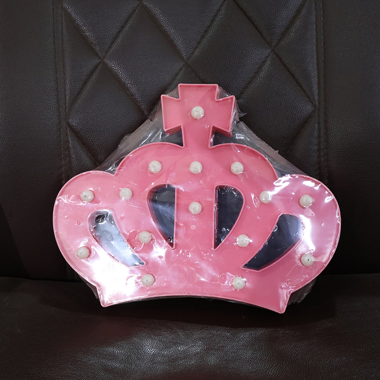 Wukusy crown-shaped LED decorative night light for home decor, glowing softly in a cozy setting.