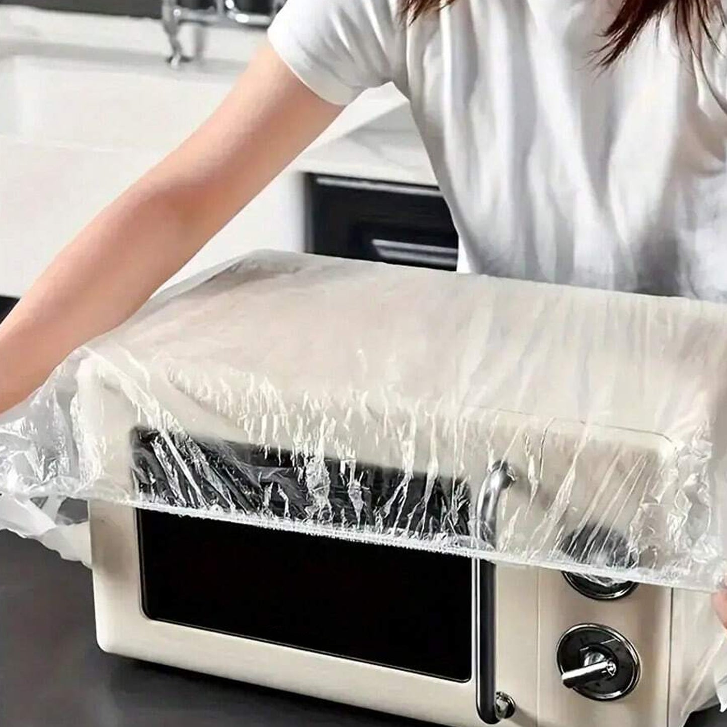 Wukusy thick disposable plastic furniture cover for home decor, large size, dust-proof, protects sofas and tables during cleaning or storage.