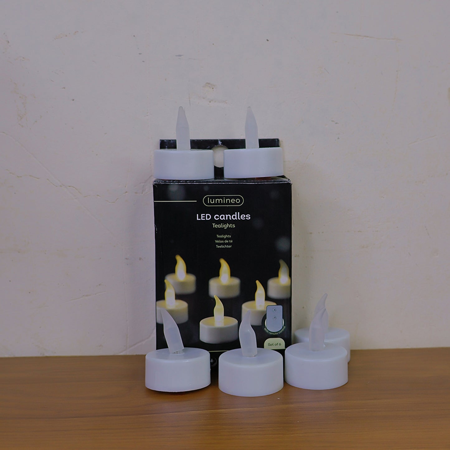 Six Wukusy LED flameless tealight candles for home decor, showing warm flickering lights in a cozy setting.