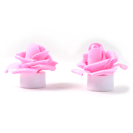 Two rose flower-shaped LED flickering tealight candles from Wukusy, ideal for home decor with a warm, flickering glow.
