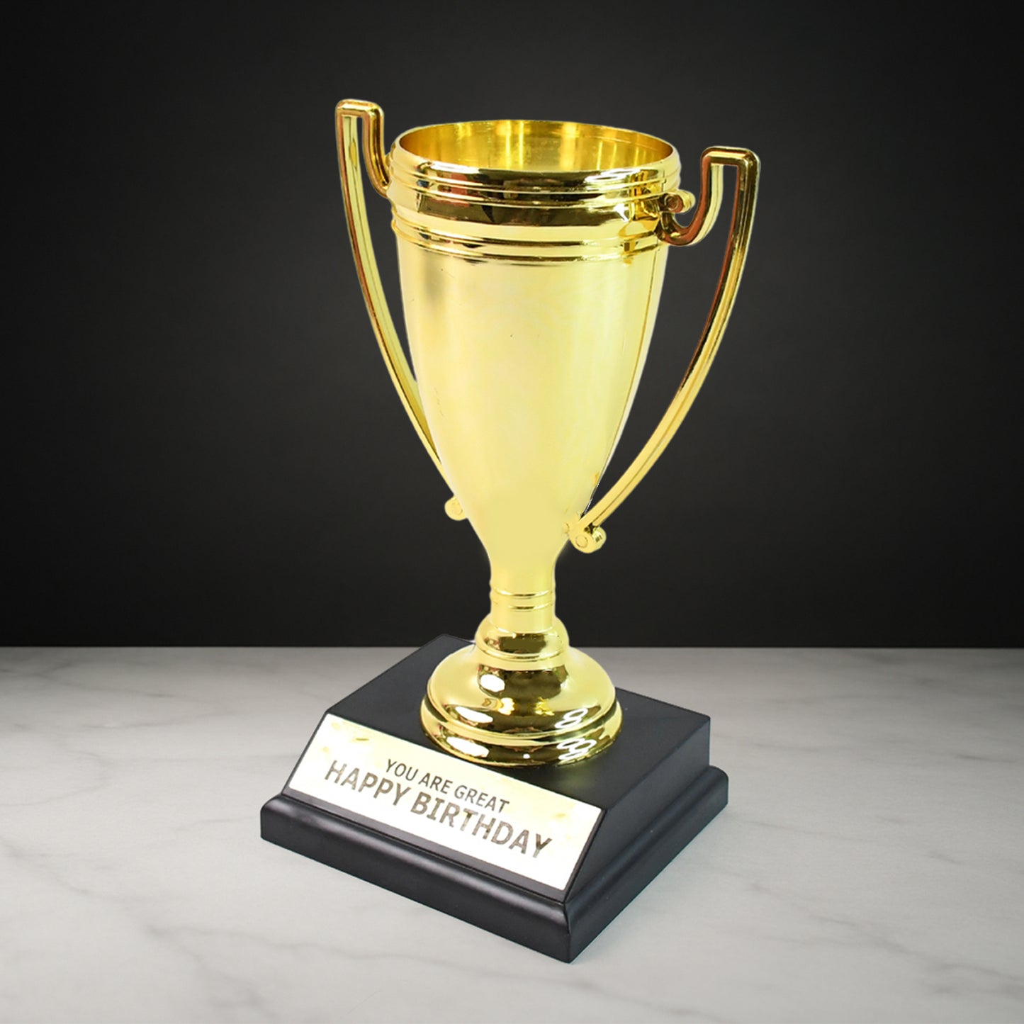 Golden Birthday Trophy by Wukusy, plastic award with base, featuring "You Are Great" and "Happy Birthday" inscriptions.