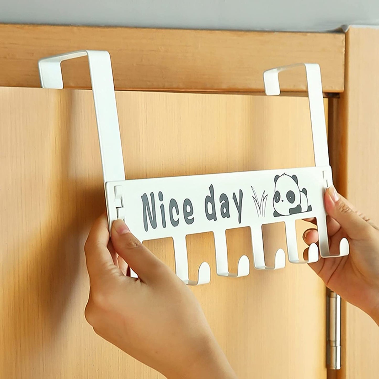 White heavy-duty carbon steel door hook hanger rack with six hooks, ideal for home organization and storage.