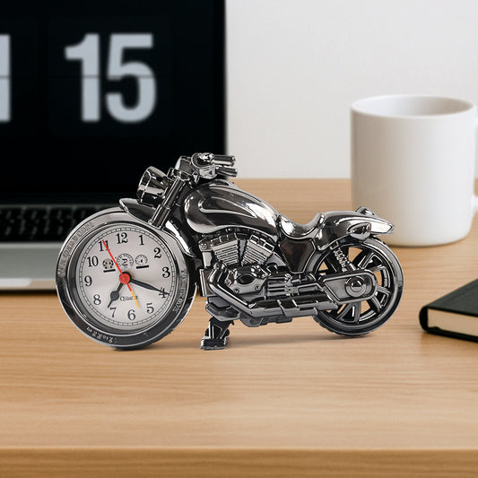 Wukusy motorcycle-themed alarm clock on a table, decorative home improvement clock with a motorcycle design for home decor.