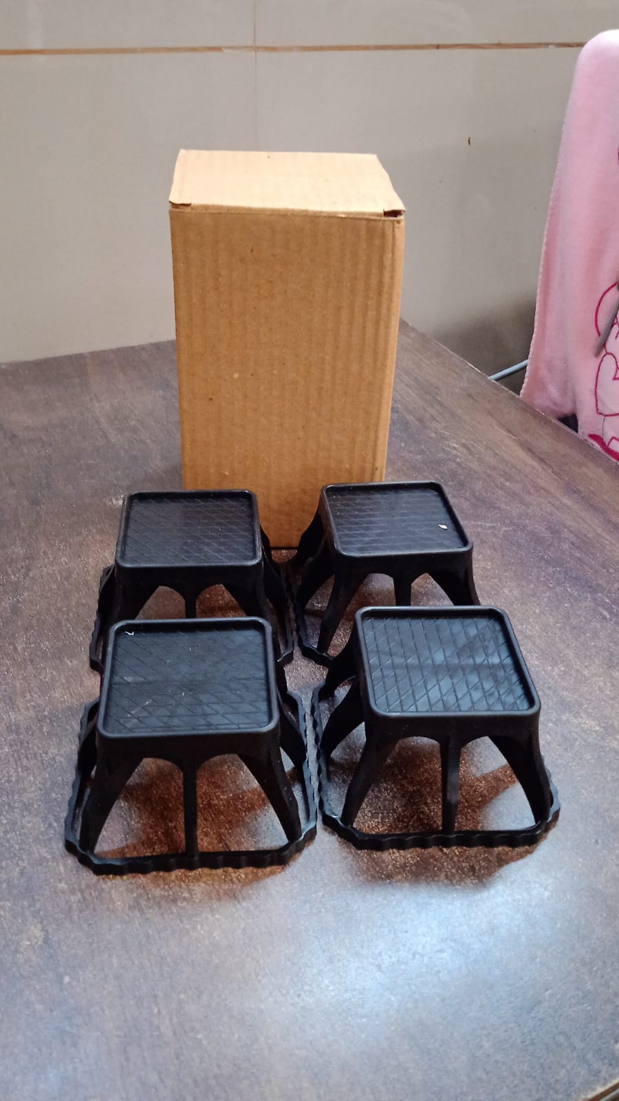 Set of four Wukusy plastic washing machine stands for home improvement, durable and versatile for appliance stabilization.