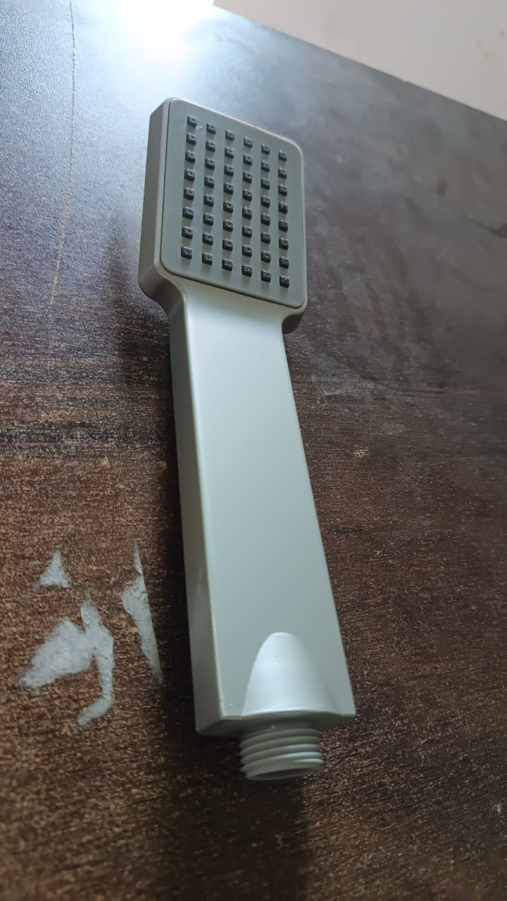 Wukusy plastic high-pressure handheld shower head for home improvement, featuring a sleek design and easy grip handle.
