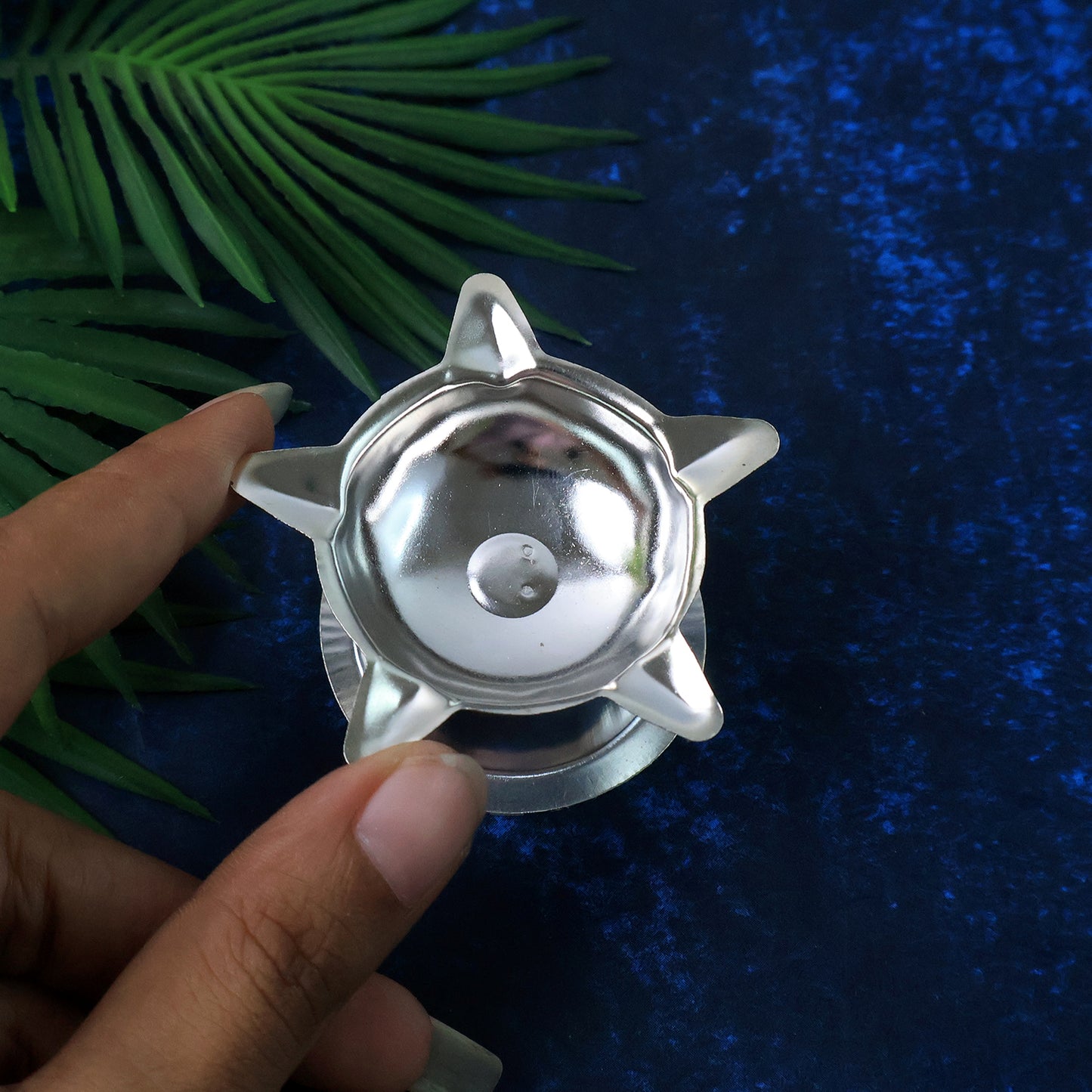 Stainless steel Lotus design Diya by Wukusy for home improvement, featuring intricate lotus shape and polished finish.