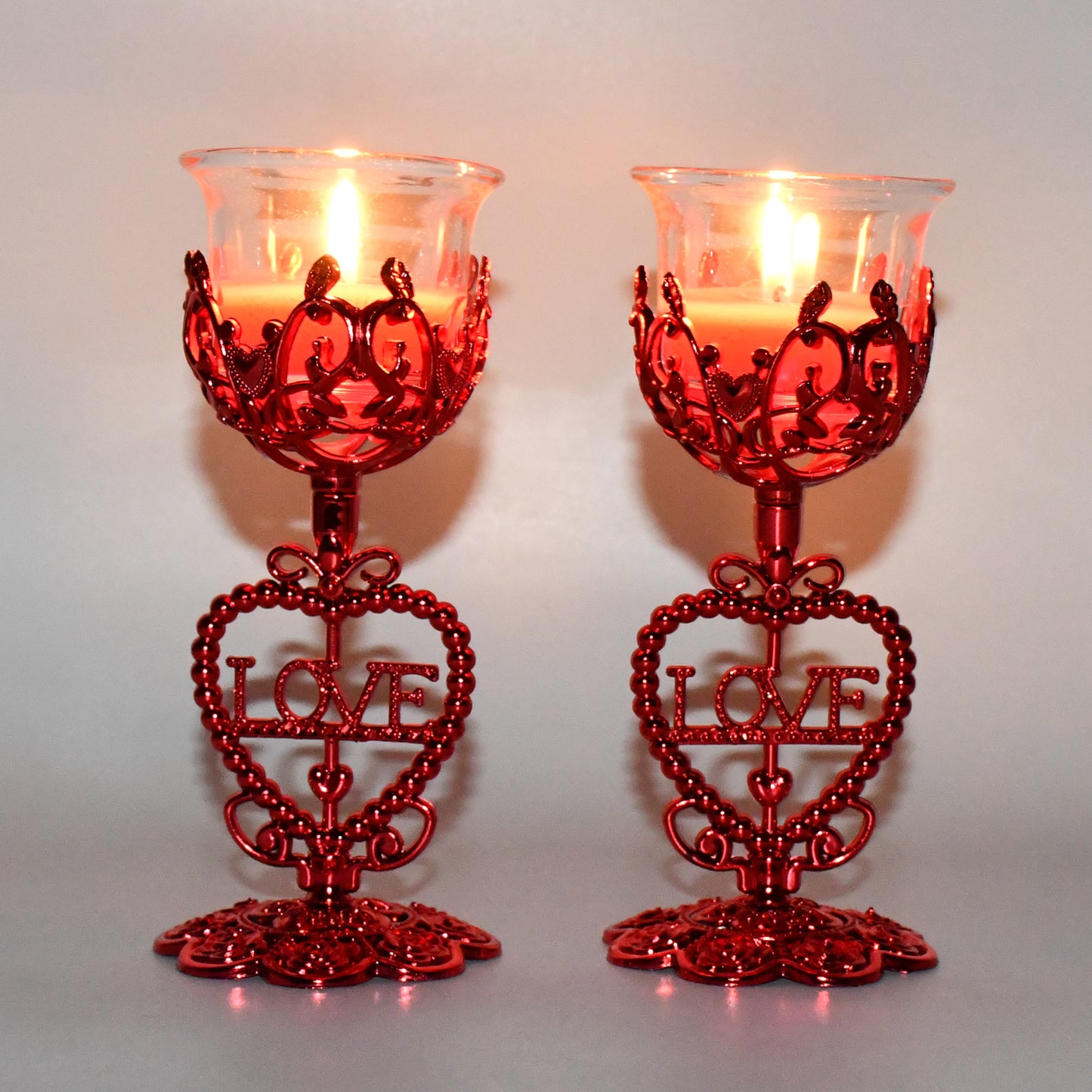 Wukusy tea lights holder candle stand set with two decorative metal candle holders for home decor and lighting.