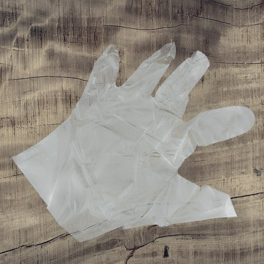 Wukusy large transparent disposable plastic hand gloves for home, kitchen, hospital, hotel, and salon use, 100-pack.