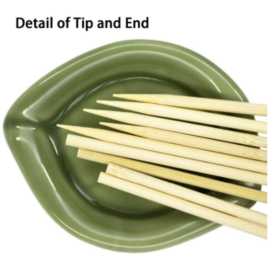 Wukusy natural bamboo wooden skewers for barbeque and grilling, shown arranged on a kitchen surface ready for use