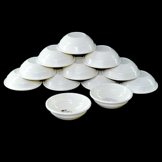 Wukusy 32-piece premium tableware set for serving food and kitchen items, includes plates, bowls, and serving dishes.