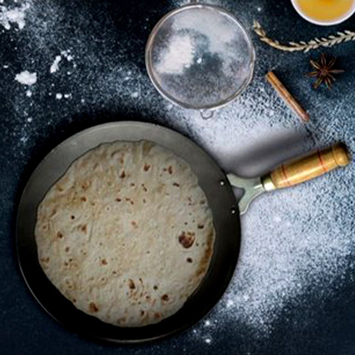 Wukusy wooden handle roti tawa for making rotis and parathas, ideal for household kitchen use.
