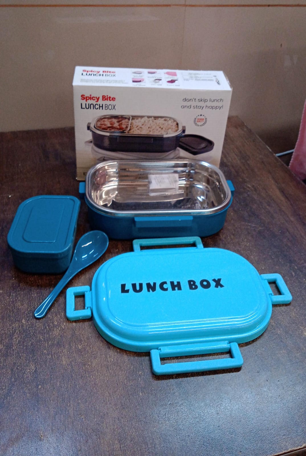 Wukusy 3-in-1 Spicy Bite stainless steel lunch box set with plastic small box and spoon, ideal for home and kitchen use.