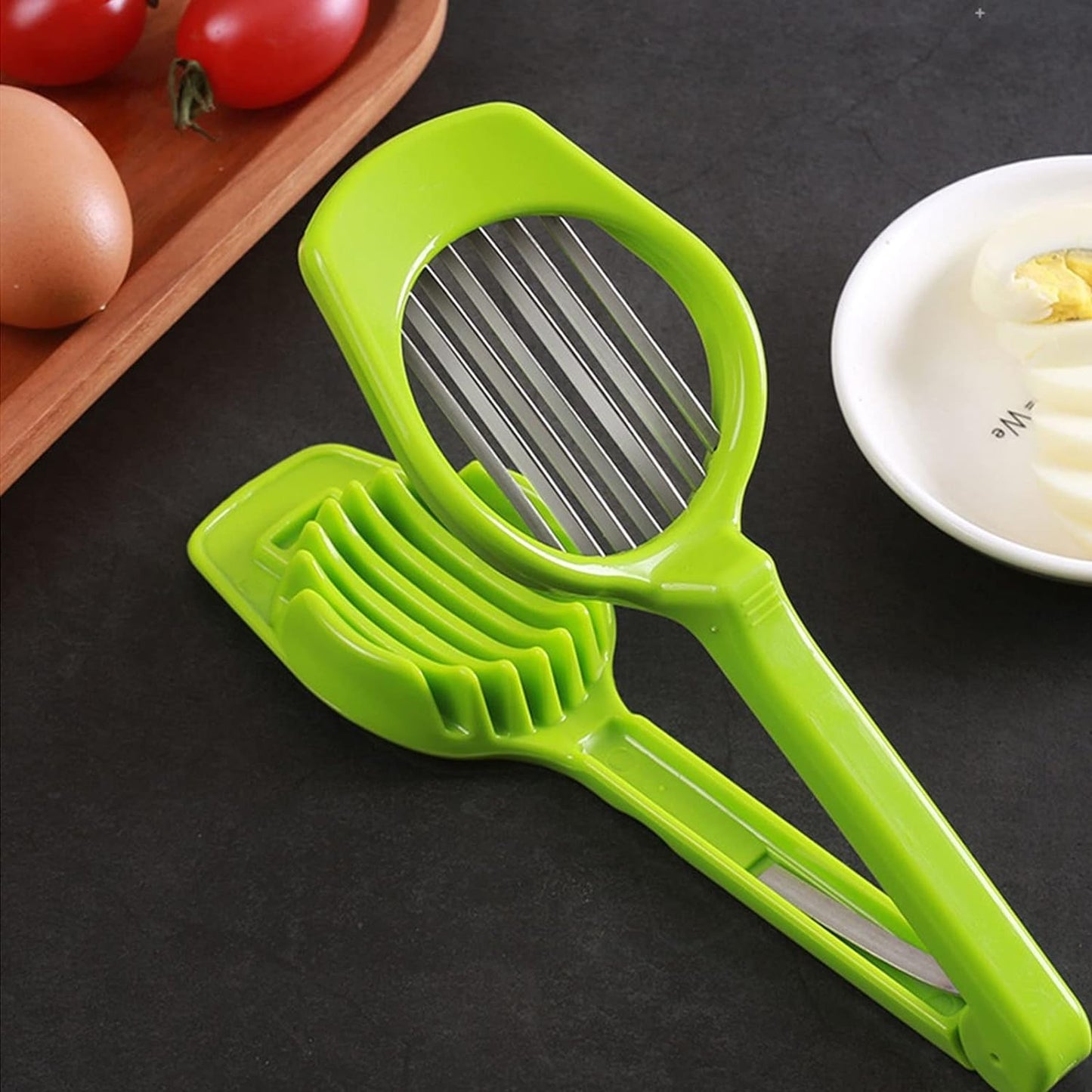 Wukusy multipurpose stainless steel slicer with seven blades for eggs, strawberries, tomatoes, kiwi, and fruit slicing.