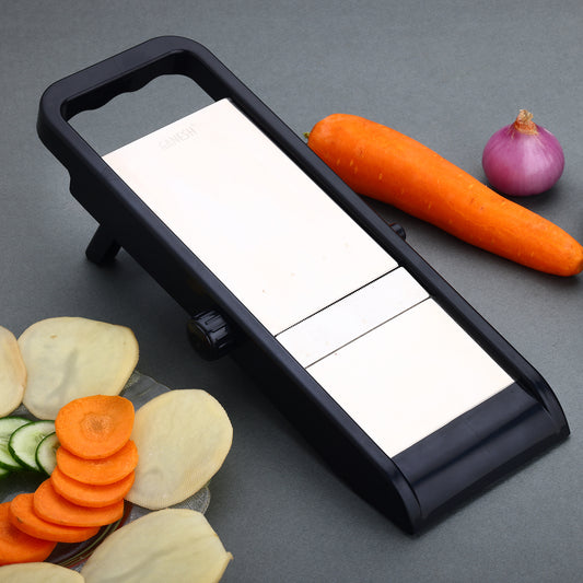 Wukusy multipurpose potato and onion slicer and grater, adjustable vegetable slicer for chips and chips cutter in a home kitchen setting.