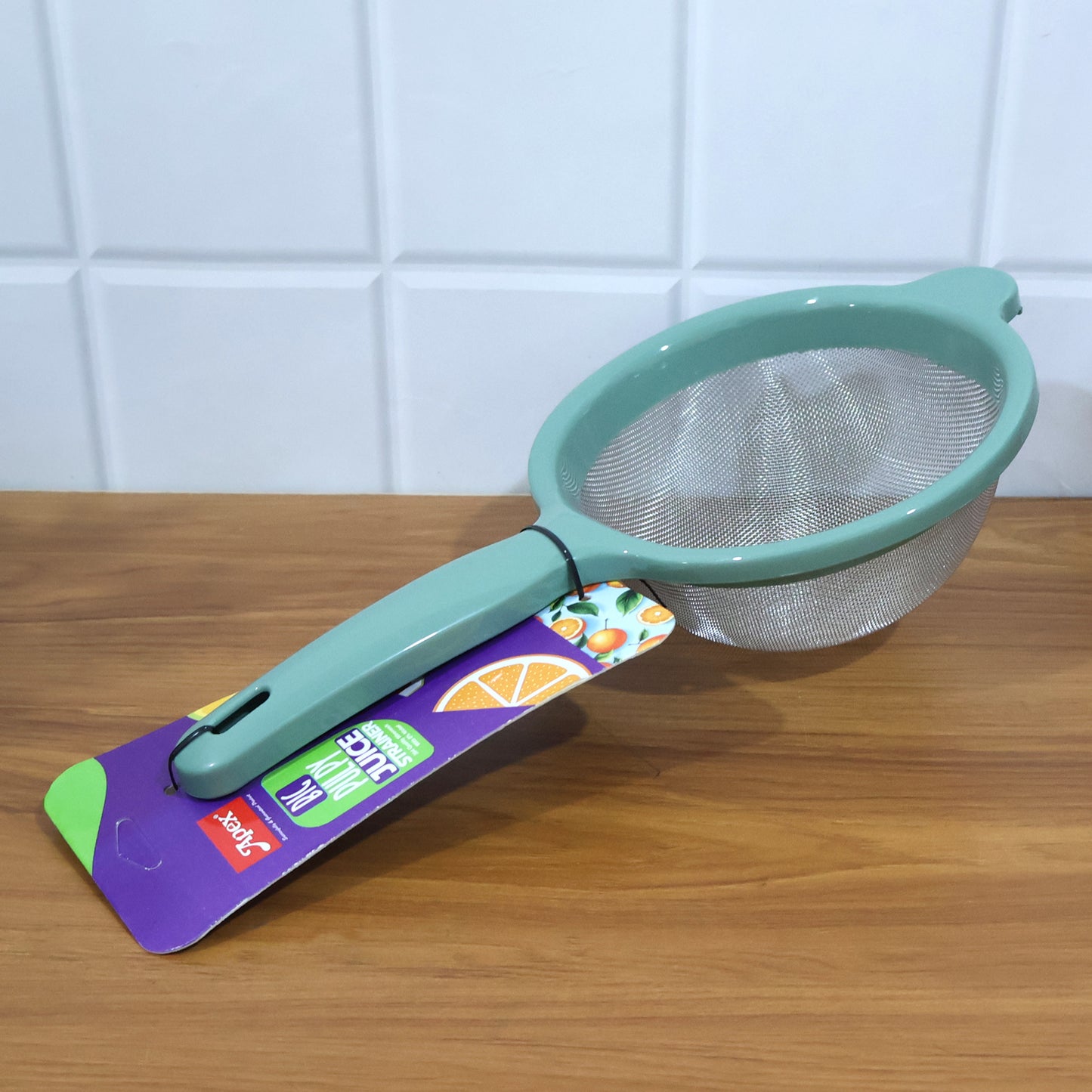 Wukusy Apex large kitchen strainer for home use, with fine mesh and sturdy handle, ideal for draining pasta and vegetables.