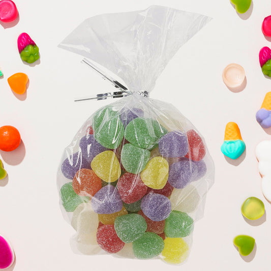 Set of 25 clear cookie and treat bags from Wukusy, flat and transparent for packaging baked goods and gifts.