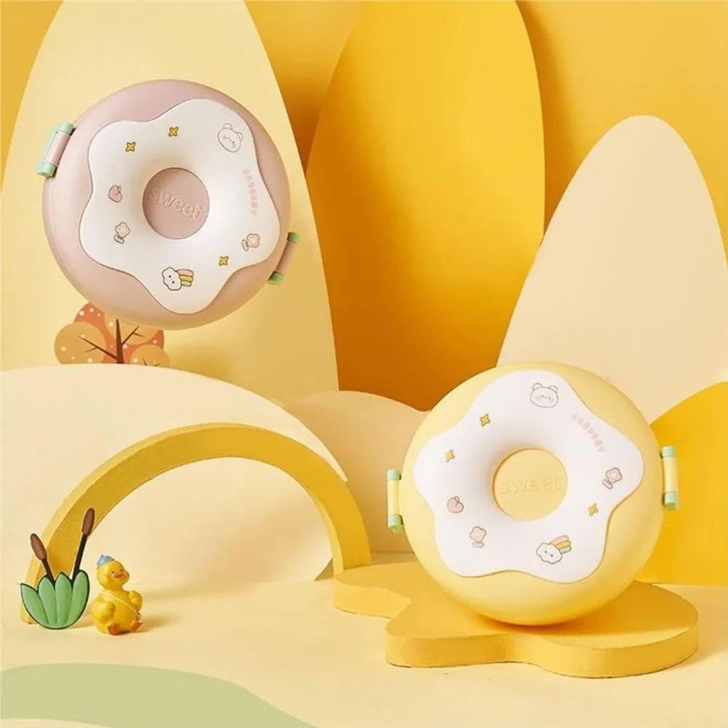 Donut-shaped Wukusy insulated lunch box with three compartments in mixed colors for home and kitchen use.