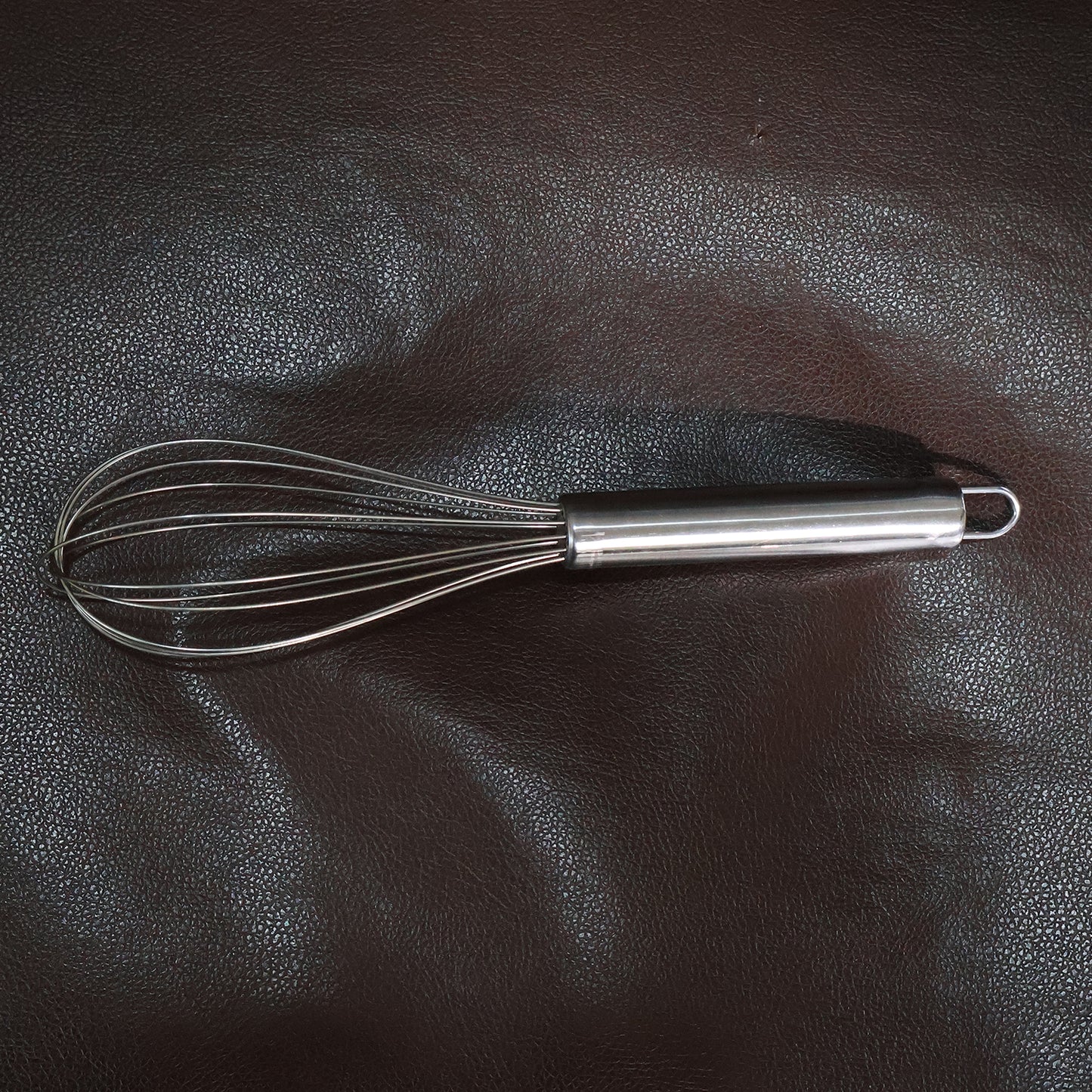 Medium stainless steel balloon whisk by Wukusy, 24cm for mixing and whisking in home and kitchen cooking tasks.